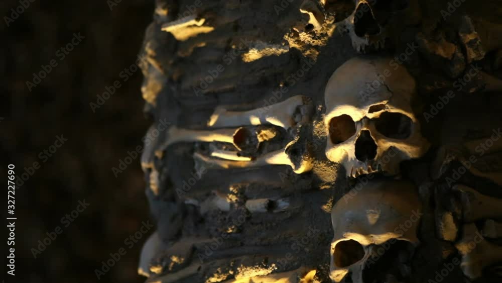 Chapel of Bones, skeletons, skulls, church, tilt up, close up, Evora, Portugal Chapel of Bones, skeletons, skulls, church, tilt up, close up, Evora, Portugal