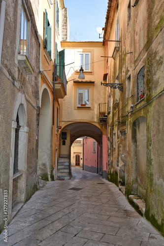 Sant Agata de  Goti  Italy  02 29 2020. A narrow street between old houses of a medieval village.