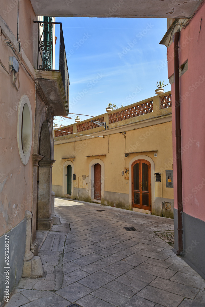 Sant'Agata de 'Goti, Italy, 02/29/2020. A narrow street between old houses of a medieval village