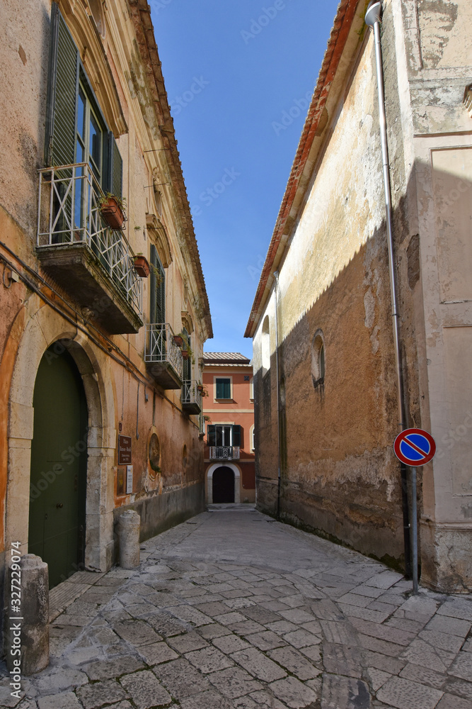 Sant'Agata de 'Goti, Italy, 02/29/2020. A narrow street between old houses of a medieval village.