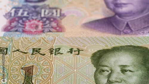 Wallpaper Mural Collection of china yuan notes macro tracking. Yuan currency background. Slider shot, low angle. 4K Torontodigital.ca
