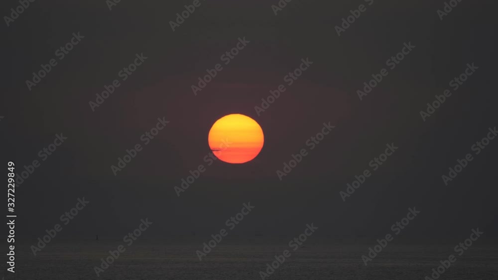 Golden sun rising on black sky, beautiful sunrise, time lapse Golden sun rising on black sky, beautiful sunrise, time lapse