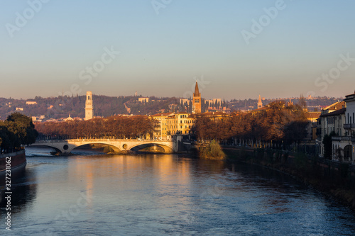 View of Verona and the Adige river from the Castelvecchio bridge  also known as the Scaliger bridge at the sunset