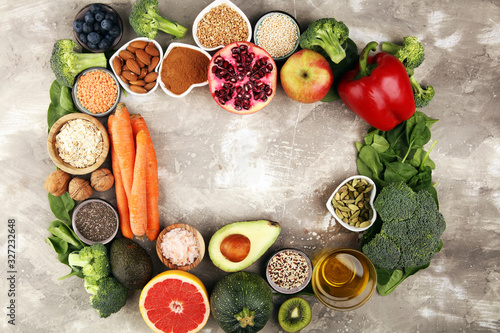 Wallpaper Mural Healthy food clean eating selection: fruit, vegetable, seeds, superfood, cereals, leaf vegetable on rustic background Torontodigital.ca