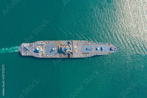 Navy aircraft carrier on the open sea Aerial view of battleship, Military sea transport, Military Navy Rescue Helicopter on board the battleship deck  © AU USAnakul+