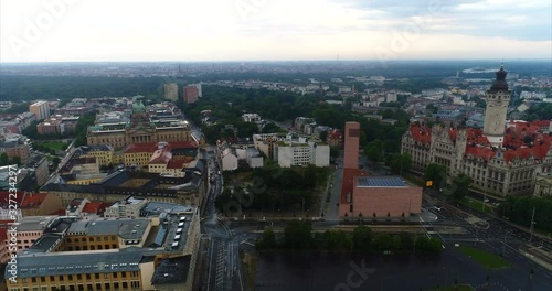Wallpaper Mural Flying a drone over the city of Leipzig. Aerial time lapse of down town. Early morning cityscape of Leipzig the largest city of Saxony, Germany. Drone hyper lapse on a rainy day  Torontodigital.ca