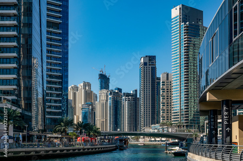 blue, sky, Sunny, day, space, distance, panorama, city, street, palm trees, houses, high-rises, skyscrapers, buildings, concrete, glass, reflections, road, canal, water, reflections, style, architectu