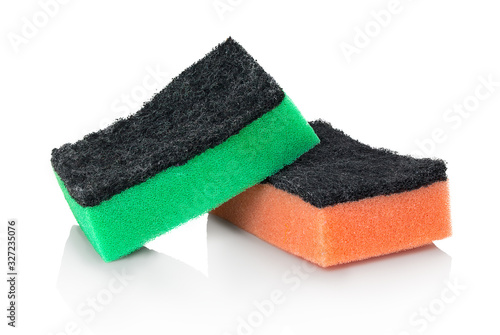 Typical double sided kitchen dish cleaning sponges. Isolated on white background with shadow reflection. With clipping path. Artificial fiber sponges. Polyurethane sponges combined with scouring pads. photo