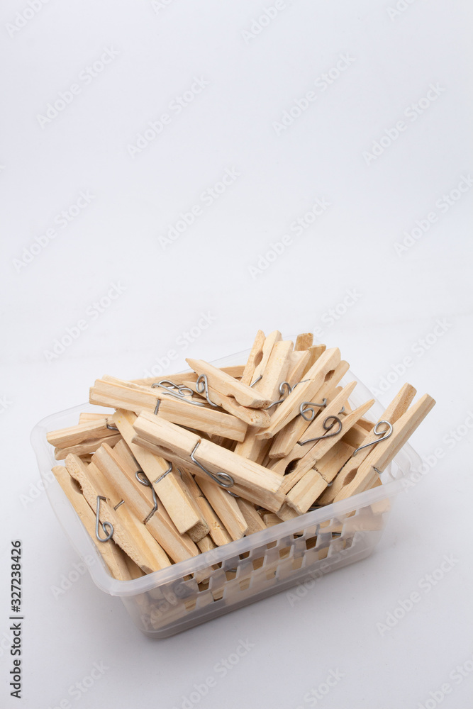 A clothespin or clothes peg is used to hang up clothes for drying, normally on a clothes line. Clothespins often come in many colors and different designs. Can be in plastic or wooden A clothespin or clothes peg is used to hang up clothes for drying, normally on a clothes line. Clothespins often come in many colors and different designs. Can be in plastic or wooden