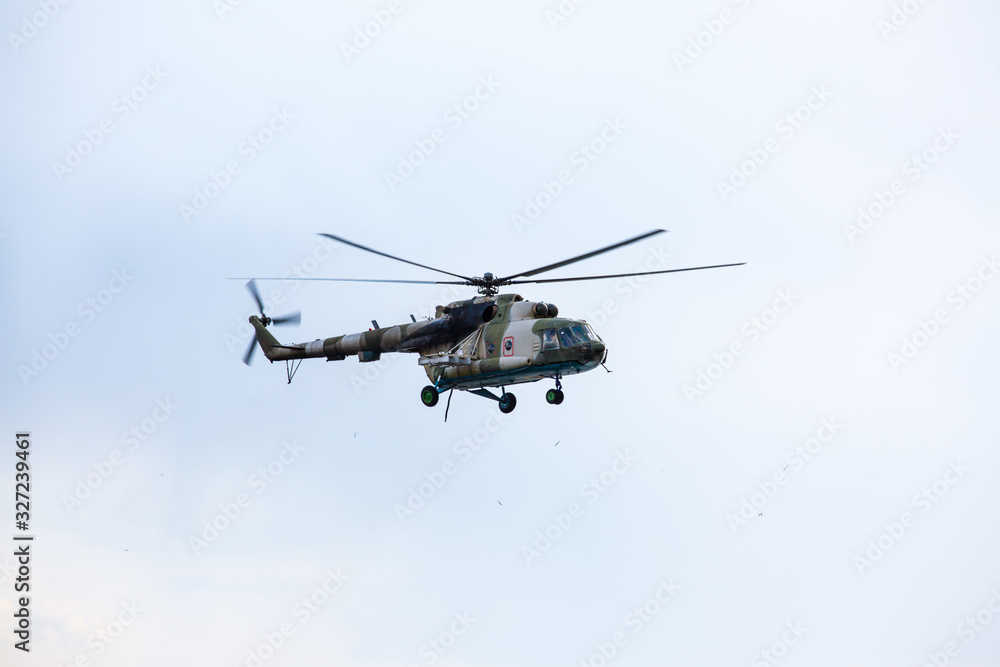 Fototapeta premium Military helicopter in the sky