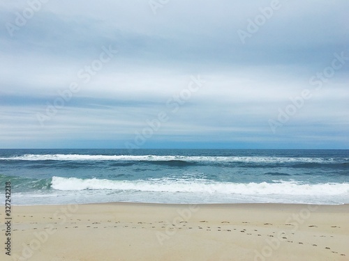 Waves crashing on an empty beach