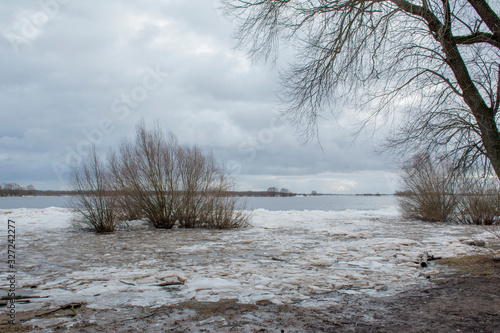 Wallpaper Mural White ice floats under the cloudy sky on the Volkhov River, Russia Torontodigital.ca
