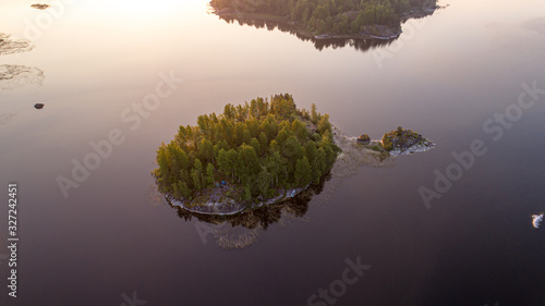 An island in the mirrored waters of Ladoga. © Александр Оборотов