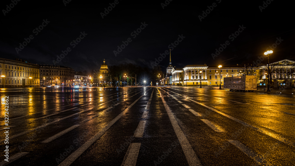Road markings on Palace Square, in the background the dome of St. Isaac's Cathedral and the spire of the Admiralty.