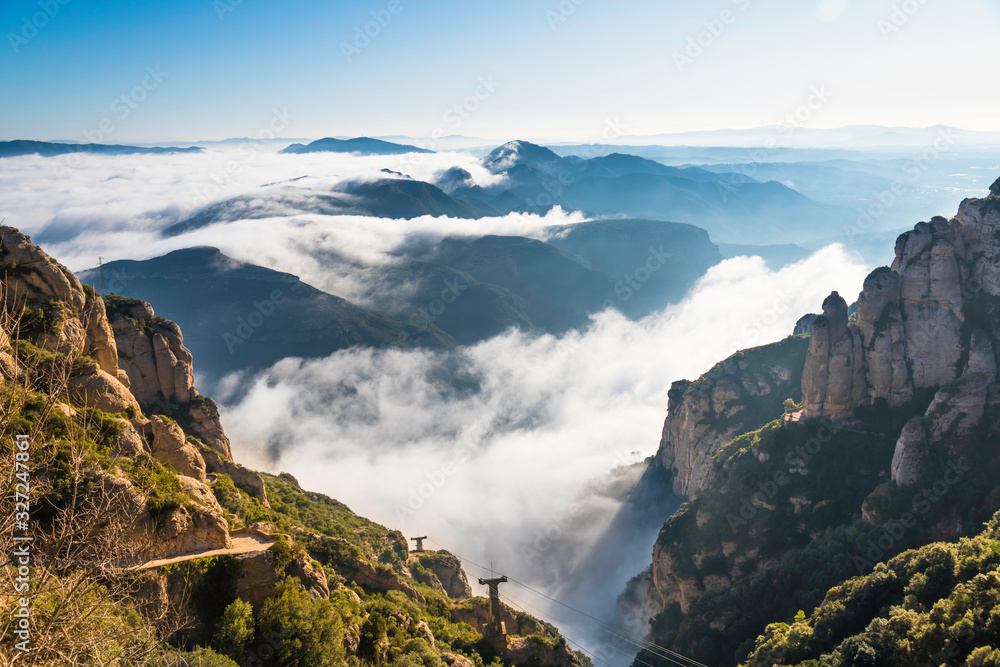 View of the Montserrat mountains from the top on a cold foggy morning