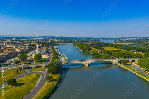 Rhone river and Avignon city under summer clear blue sky © Quang