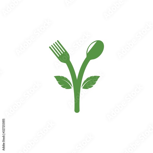 fork and spoon with leaves icon of vegetarian food vector