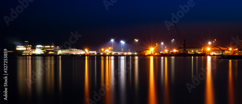 Poole quay lights and reflections at night © allouphoto