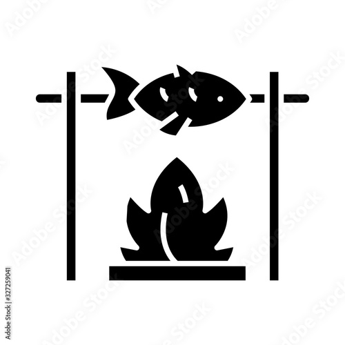Fish on a spit black icon, concept illustration, vector flat symbol, glyph sign.