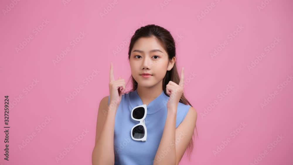 Portrait of beautiful asian woman looking to camera with attractive smile. People with beauty and skin care concept...woman smile and laugh joyfully on isolated white background.4K UHD. Portrait of beautiful asian woman looking to camera with attractive smile. People with beauty and skin care concept...woman smile and laugh joyfully on isolated white background.4K UHD.
