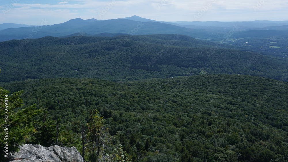 Naklejka premium A scenic view from the Laraway Mountain Overlook towards Mount Mansfield and Camel's Hump on the Long Trail in Vermont.