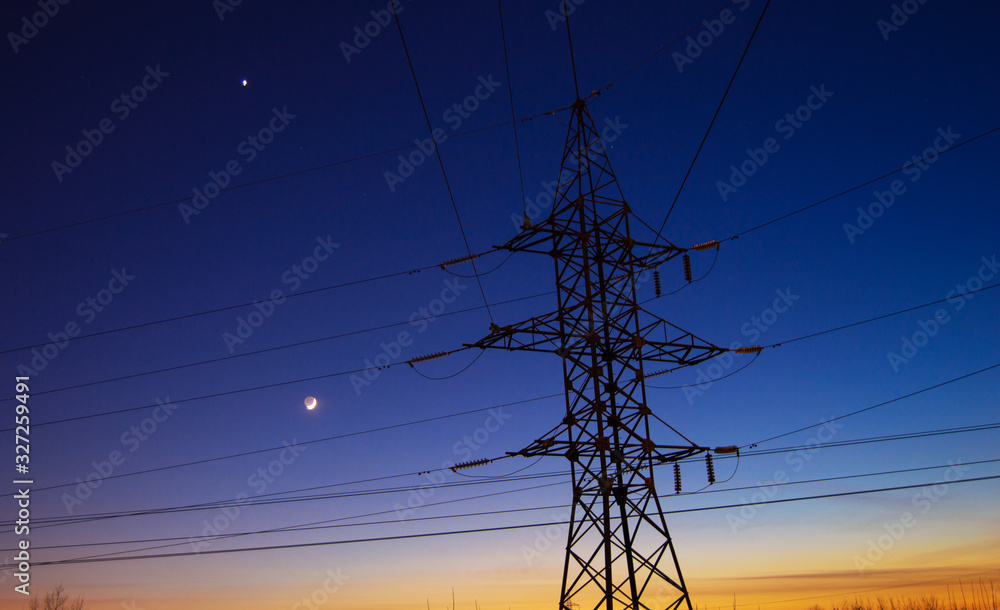 Electric tower on the background of night sky