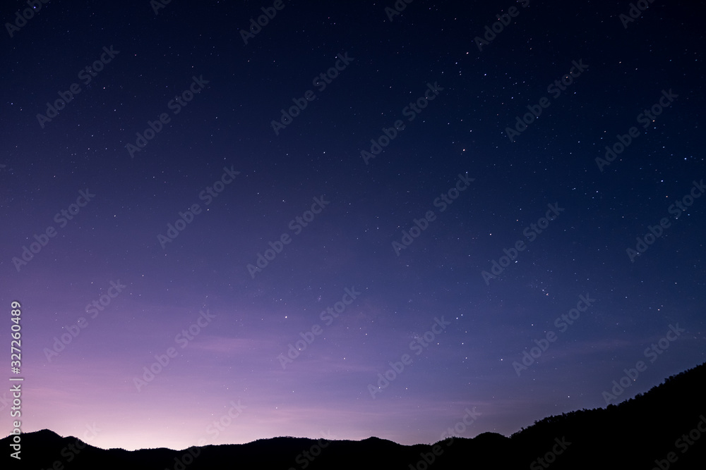 The stars and the milky way in the dark sky at night are very beautiful.