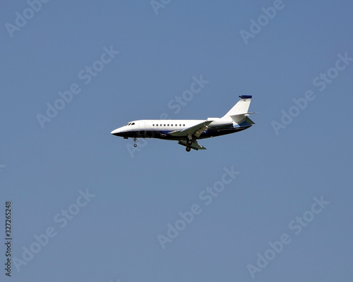 Small passenger jet aircraft preparing to land at a southeast florida airport 