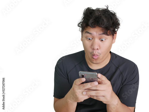 asians guy watching in to the smartphone screen 