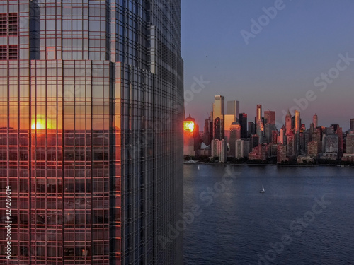 Jersey City Goldman Sachs with New York skyline in sunset, aerial photography photo