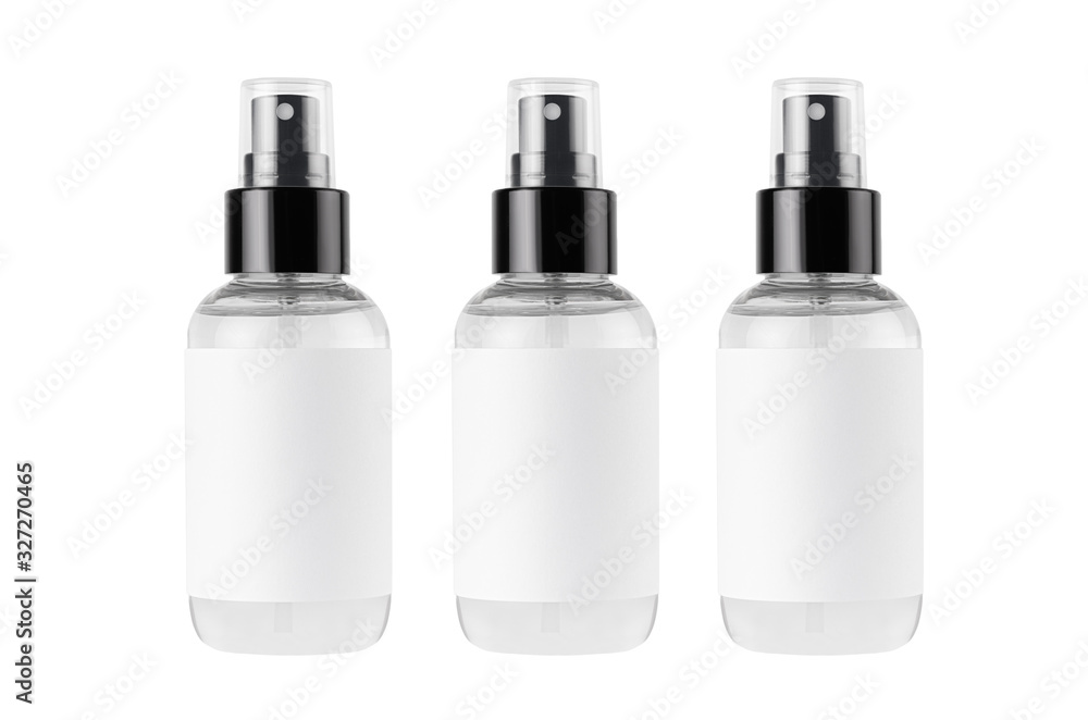 Three spray bottles for cosmetics product with white blank label isolated on white background, mock up for branding, advertising, design. Three spray bottles for cosmetics product with white blank label isolated on white background, mock up for branding, advertising, design.