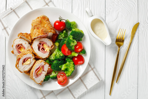 Fotografía Chicken Cordon Bleu on a white plate