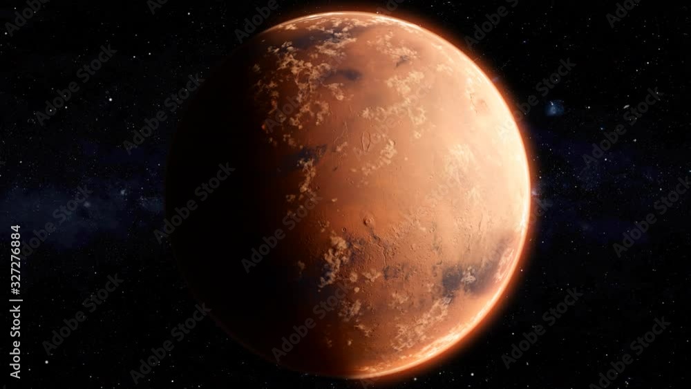 Traveling to the red planet Mars in space. The day/night terminator is visible as the Mars rotates. Traveling to the red planet Mars in space. The day/night terminator is visible as the Mars rotates.