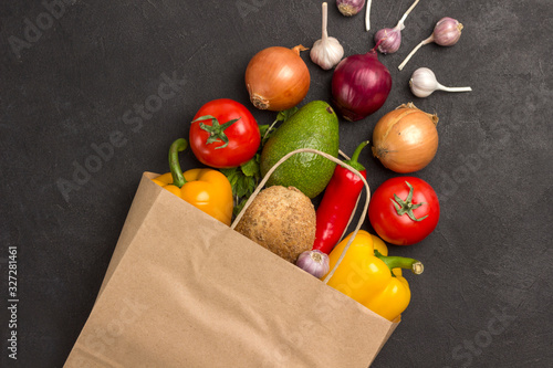 Fototapeta Naklejka Na Ścianę i Meble -  Set of balanced products for healthy diet. Paper bag with vegetables