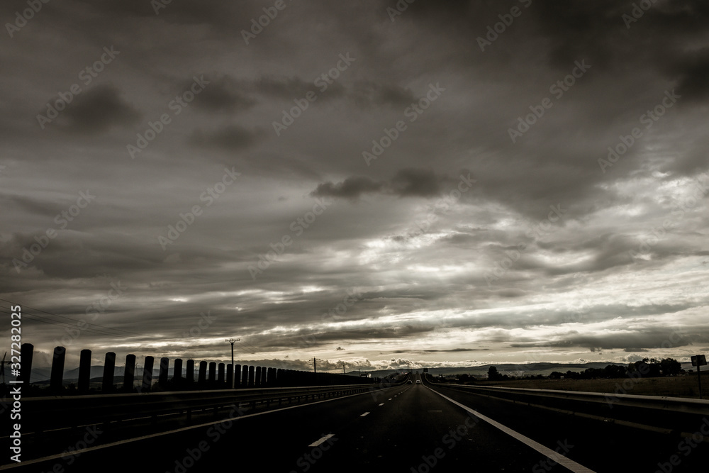 Large stretch of highway in an overcast scenery