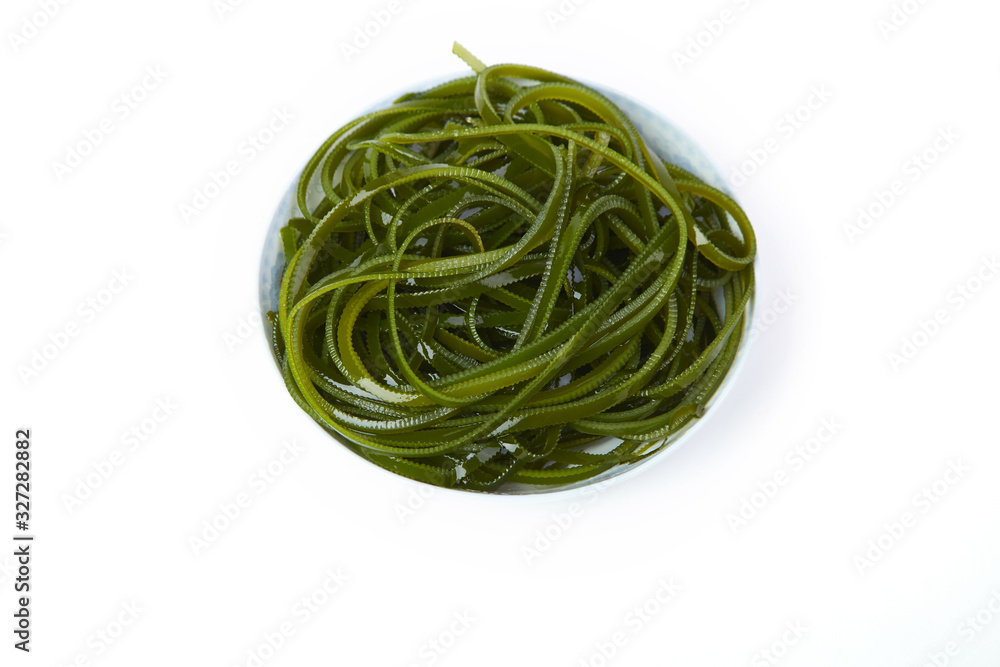 Fresh kelp knots on the plate,