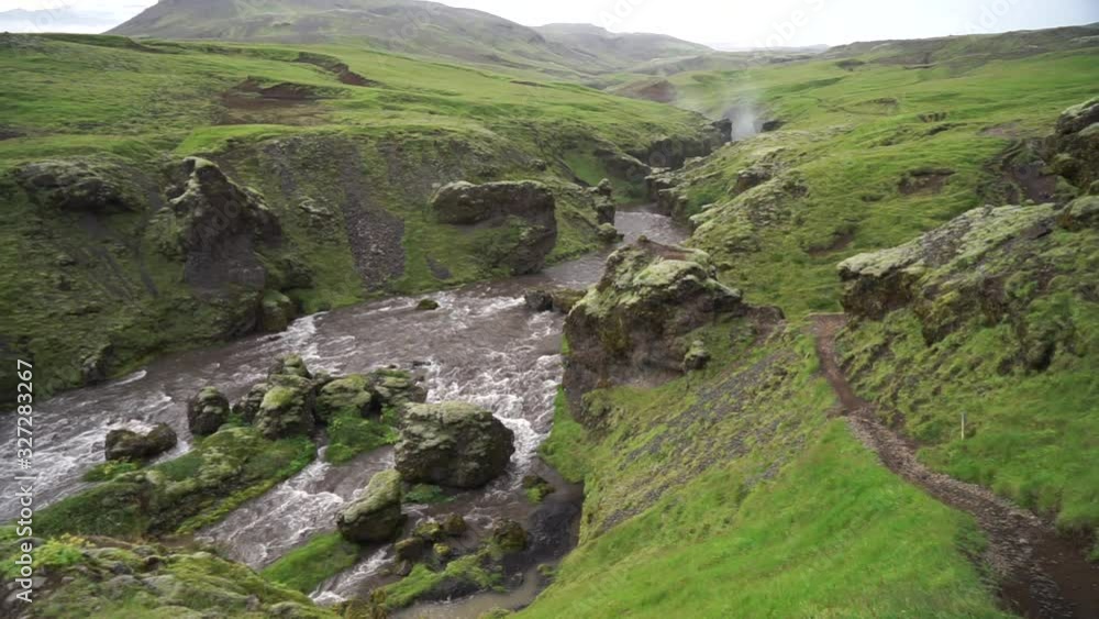 Slow motion of the river in the green canyon in Iceland. Slow motion of the river in the green canyon in Iceland.