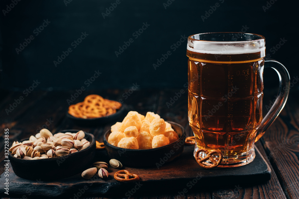 beer. refreshing light drink and salted snacks. friday party atmosphere, craft brewery, bar table. restaurant, pub, food concept. beer. refreshing light drink and salted snacks. friday party atmosphere, craft brewery, bar table. restaurant, pub, food concept.