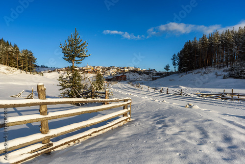 Winter morning at Bulgarian village Medeni Poliani in Rhodopes mountain  photo