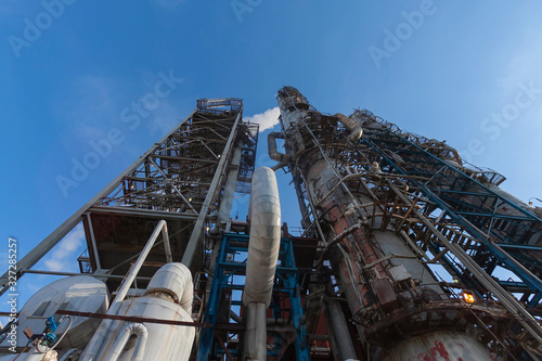 Reaction tanks at a chemical plant for the production of mineral fertilizers, nitric acid, ammonia, phosphorus fertilizers, ammonium, nitrate. In the daytime.
