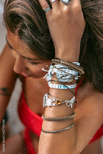 close up of beautiful young woman with stylish boho accessories