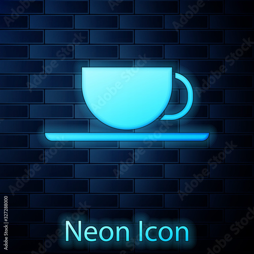 Glowing neon Coffee cup icon isolated on brick wall background. Tea cup. Hot drink coffee. Vector Illustration