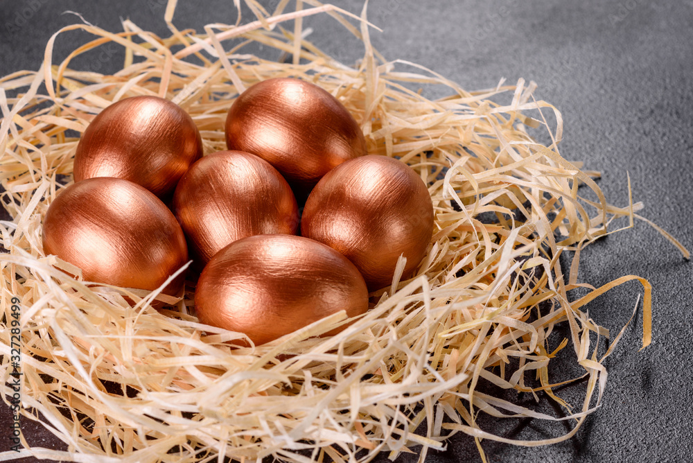 Easter golden eggs in the nest, preparation for the holiday Easter golden eggs in the nest, preparation for the holiday