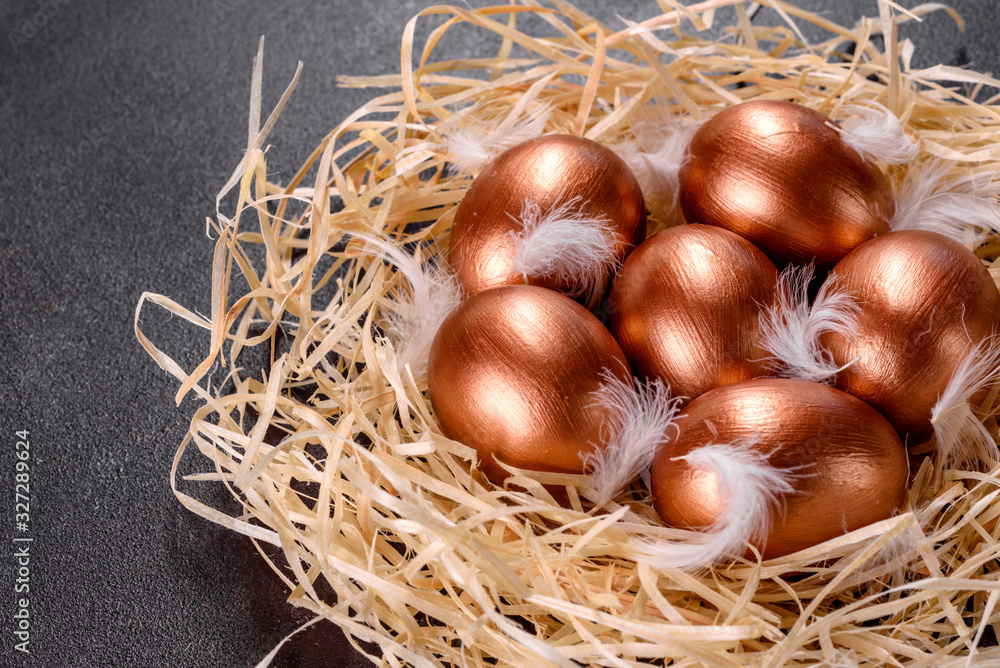 Easter golden eggs in the nest, preparation for the holiday Easter golden eggs in the nest, preparation for the holiday