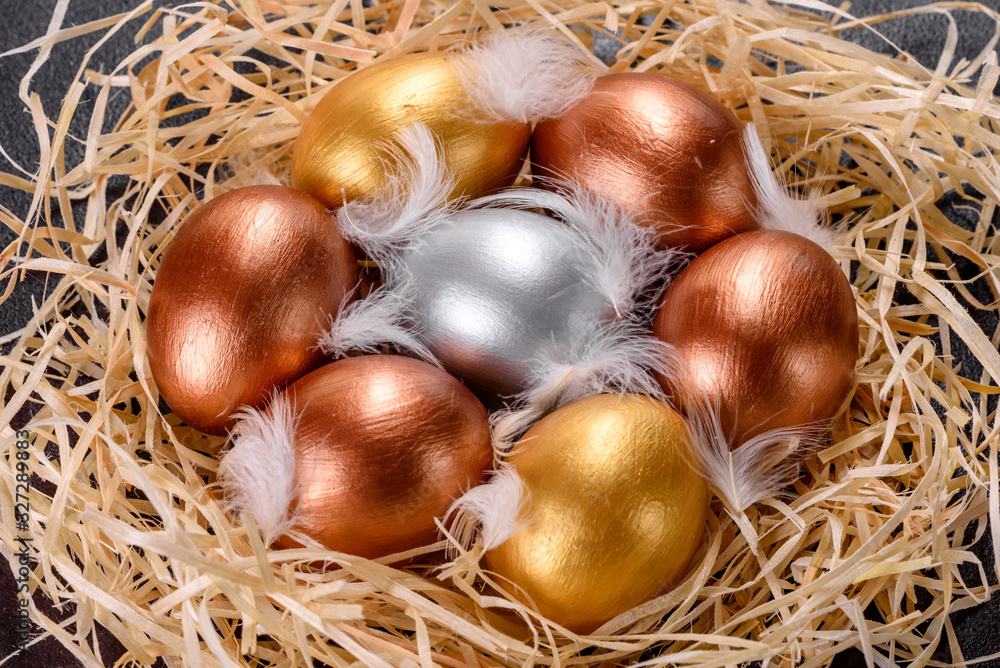 Easter golden eggs in the nest, preparation for the holiday Easter golden eggs in the nest, preparation for the holiday