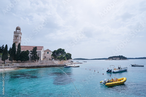 Hvar Old Town Promenade. Sea coast in Dalmatia,Croatia. A famous tourist destination on the Adriatic sea. Old town and marina.