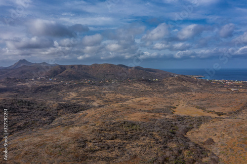 Aerial view of coast of Curaçao in the Caribbean Sea with turquoise water, cliff, beach and beautiful coral reef over Watamula © NaturePicsFilms