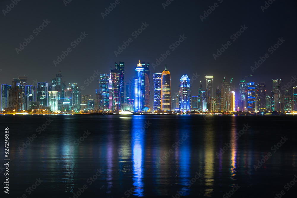 Vibrant Skyline of Doha at Night as seen from the opposite side of the capital city bay at night