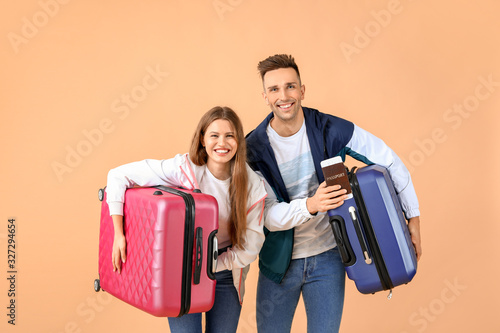 Couple of young tourists wi...