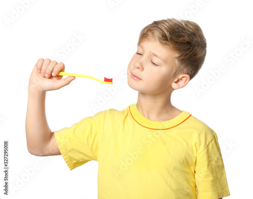 Cute little boy with toothb...